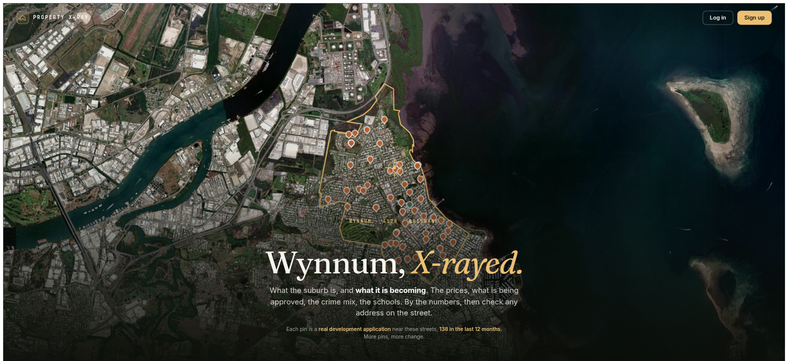 Aerial view of Wynnum on its suburb page at propertyxray.com.au, with the suburb boundary traced in gold along the Moreton Bay waterfront and orange pins marking 138 development applications lodged near its streets in the last 12 months.